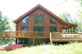 Custom Log Homes Built by Carlton Construction MN.