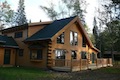 Custom Log Homes Built by Carlton Construction MN.